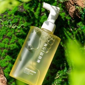 A skincare bottle with pump placed on lush moss, conveying purity and nature.